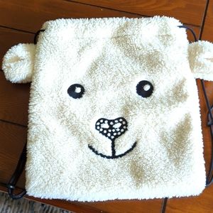 Poivre Blanc plush back pack.